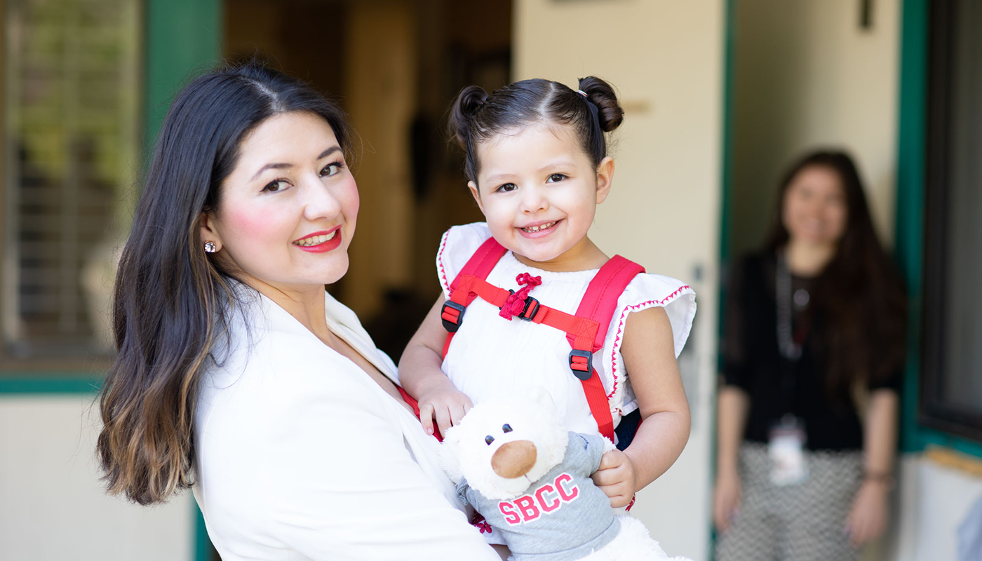 A mom dropping her daughter off at SBCC's Early Childhood Education Center.